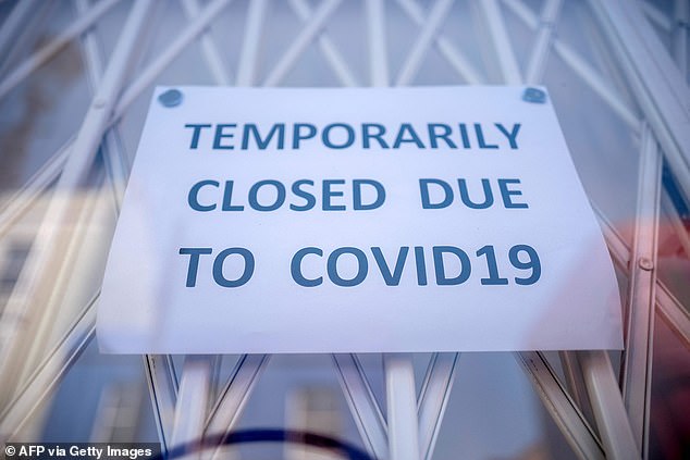 Lockdowns have not had a big impact on coronavirus death rates around the world, scientists have claimed. Pictured, a closed shop in Britain
