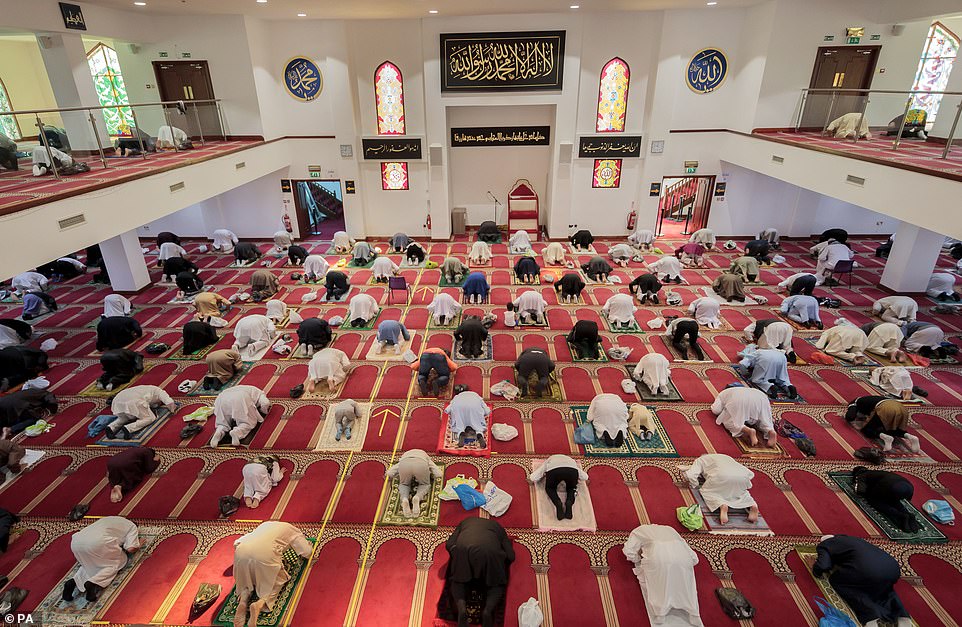 Worshippers observe social distancing at the Bradford Central Mosque on the first day of Eid