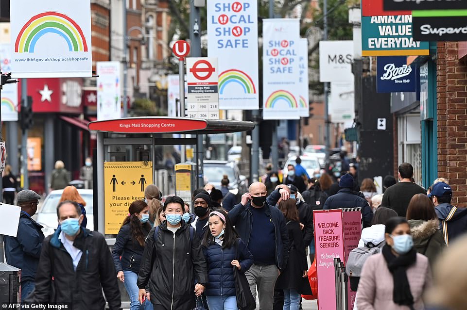 London this weekend saw the streets busy with shoppers, many of whom were in masks